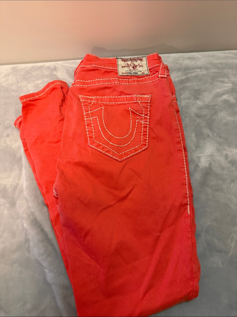 True Religion Coral-Red Jeans with Signature Back Pocket